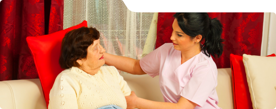 caregiver assisting her patient